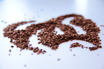 Coffee granules on a light background