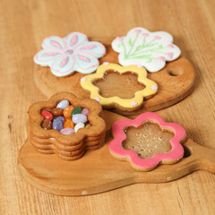 Homemade Ginger Cookies in the shape of Jewelry box on the wooden background. Closeup view. square picture