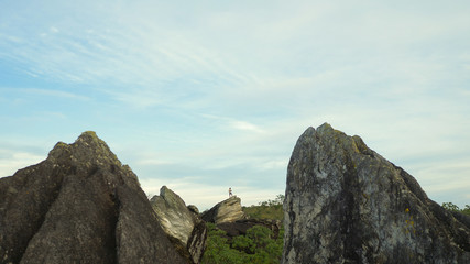 Man exploring nature with backpack and camera