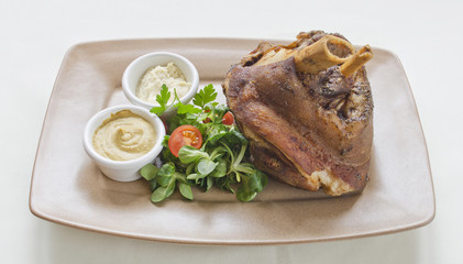 Dinner with meat, salad and sauce