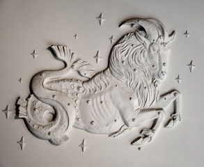 The bas-relief of the zodiac sign Capricorn