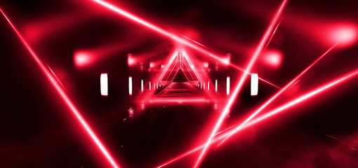 Red abstract background, red neon, spotlights. The tunnel with the rays of red light.