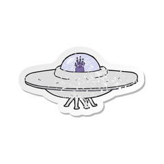 retro distressed sticker of a cartoon flying saucer