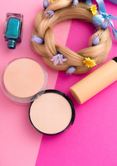 Obraz na płótnie Canvas still life with make up products on pink