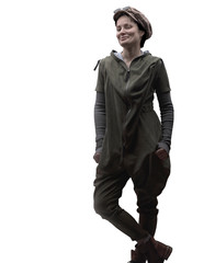 Young woman in a green jumpsuit in a cap and glasses posing in the studio isolated on a white background.