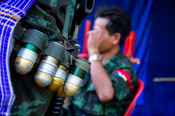 Mon soldier sling gun and bullet in Mon independence day