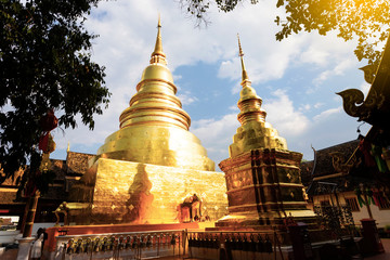 Fototapeta premium CHIANGMAI, THAILAND - FEBRUARY 17, 2019 : Pagoda in Wat Phra Singh in Chiangmai, Thailand. Wat Phra Singh is the famous Buddhist temple in downtown of Chiangmai