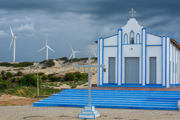 Church in front of Wind farm at Canoa Quebrada in Brazil