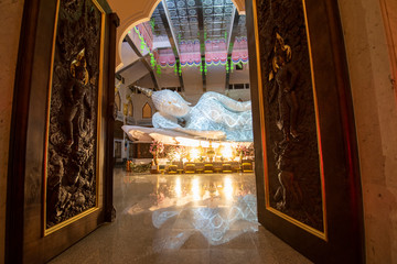Buddhist temple decoration carved marble big white buddha statue sleep © Bigc Studio