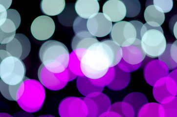 Colorful blur bokeh fairy street light festival, night defocused & dark background.