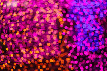 Colorful blur bokeh fairy street light festival, night defocused & dark background.