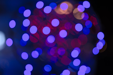 Colorful blur bokeh fairy street light festival, night defocused & dark background.