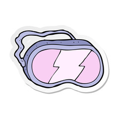 sticker of a cartoon ski goggles