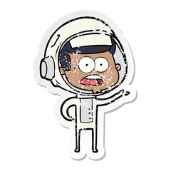 distressed sticker of a cartoon surprised astronaut