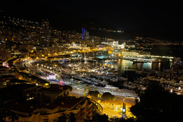 Obraz premium Panorama of Monte Carlo at night from the village of Monaco with Port Hercules