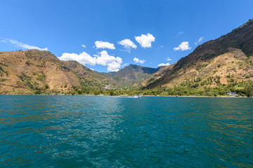 Shore of Santa Cruz la Laguna at Lake Atitlan in vulcano landscape of Guatemala