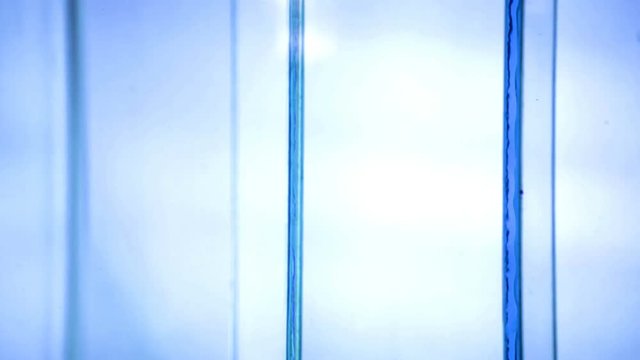 Abstract geometric background with transparent blue glass moving shapes