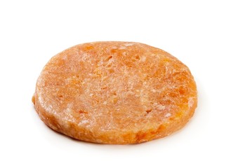 Raw meat cutlet on white background