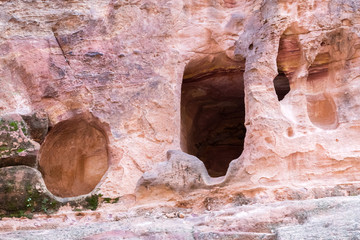 Cave in the rock in the city of Petra, Jordan. Petra is a historical and archaeological city in southern Jordan.