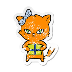 Obraz na płótnie Canvas distressed sticker of a cute cartoon cat with present