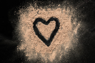 Heart shape eyeshadow powder symbol on black background