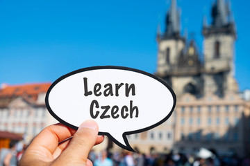 signboard with the text learn Czech in Prague