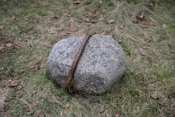 Untreated rough natural gray stone in everyday environment