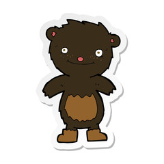 sticker of a cartoon teddy black bear wearing boots