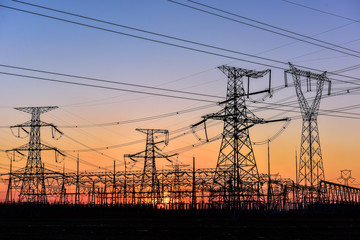 Contour of Transmission Tower at Sunset