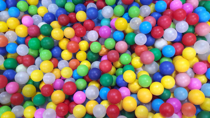 Fototapeta na wymiar Multi-colored plastic balls. A children's playroom. beautiful toys
