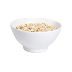 A bowl with oat-flakes isolated on white background.