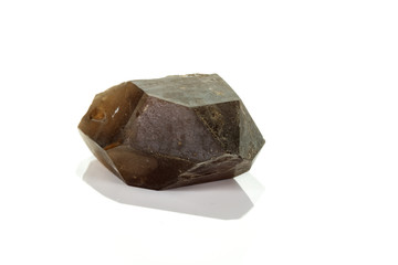 Macro mineral stone smoky quartz, rauchtopaz on a white background