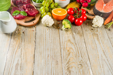 Flexitarian diet diet, with fresh vegetables, raw meat and fish, legumes, grains, fruit, wooden background, copy space top view