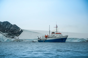 Expedition ship, cruise in Antarctic landscape, Paulet island, near the Antarctic Peninsula