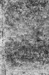 vertical background of old, shabby gray concrete wall
