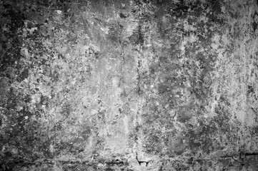 horizontal background of old cracked gray concrete wall