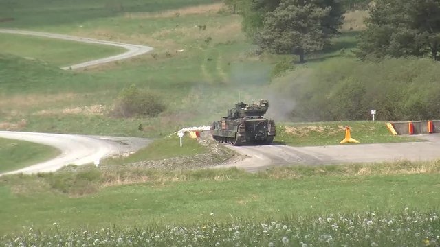Bradley fighting vehicle firing main gun 3