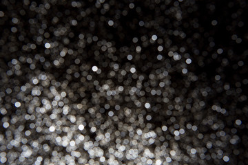 Glitter vintage lights background. Abstract blur background.