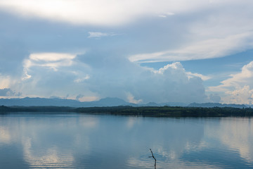 Blue sky high peak mountains fog hills mist scenery river lake dam bay gulf wildlife  National park views Kanchanaburi, Thailand.