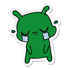 sticker cartoon of cute sad alien