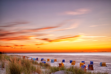 Sunset at the beach on the East Frisian Island Juist in the North Sea, Germany.