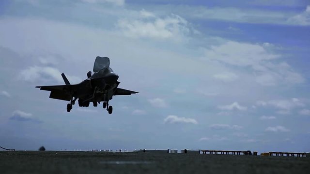 F-35 Jet fighter landing on aircraft carrier 1