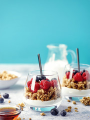 Parfait dessert of yogurt, granola and fresh berries