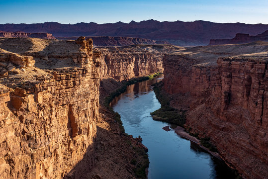 The Colorado river running through a section of Glen Canoyon near Navajo Bridge of of the 89A in Arizona. Landscape image with copy space.