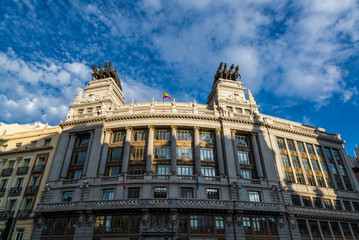 Bilbao bank Building with two Quadriga sculptures on the roof, Madrid, Spain
