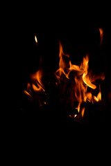 Fototapeta na wymiar Fire flame isolated on black background