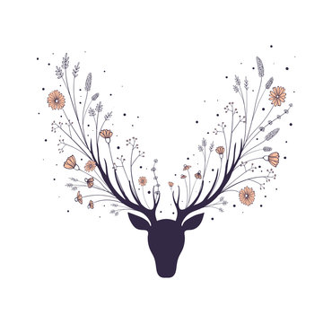Flowers in the horns of a deer. Silhouette of the head of a forest animal.