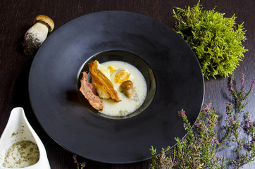 Soup with bacon, mushrooms and egg