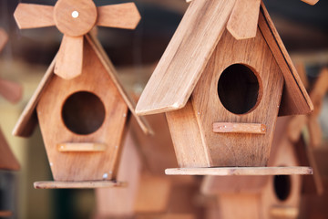 Obraz na płótnie Canvas close up of wooden bird house.