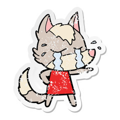 distressed sticker of a cartoon crying wolf
